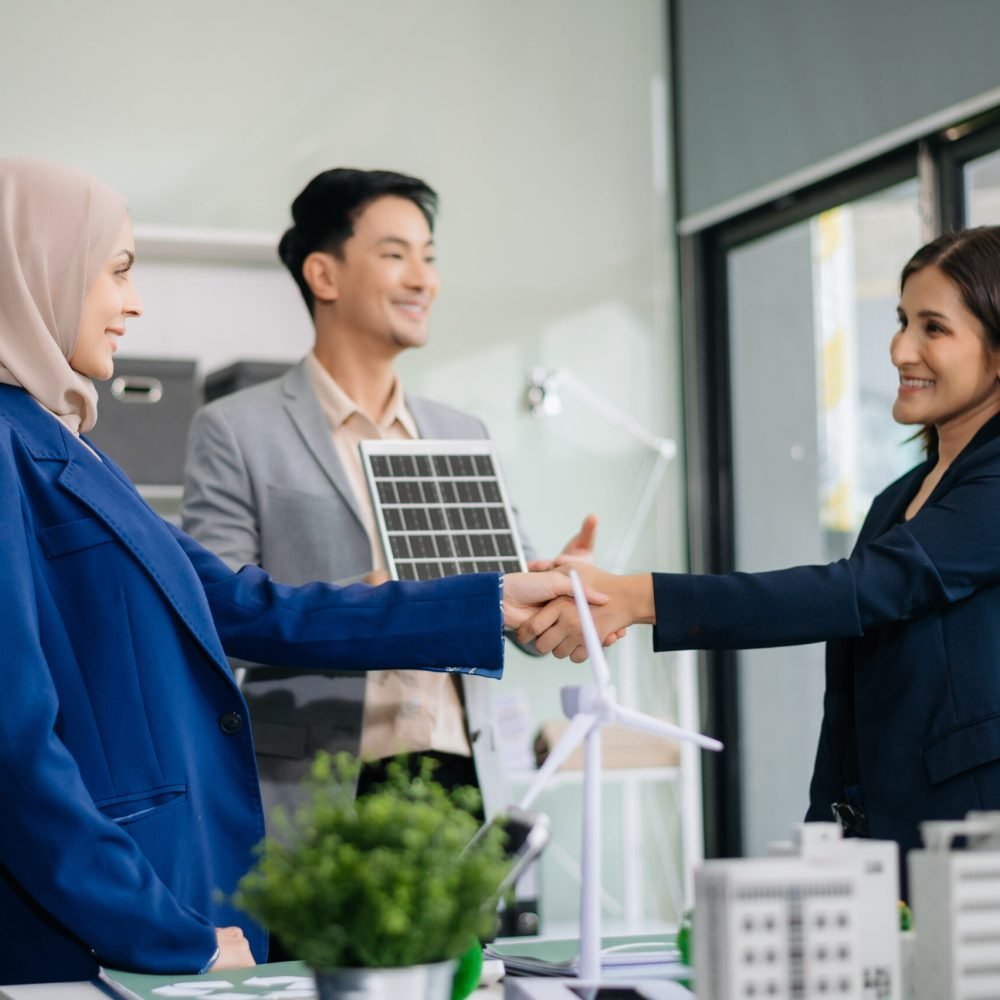 Discussion among businesspeople on the latest developments in solar cell panel technology and Solar Energy Environment city Concept.